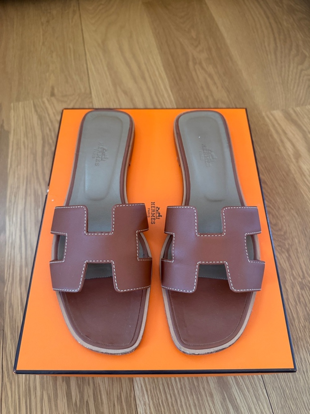 Hermès Oran Gold Leather Slide Sandals
